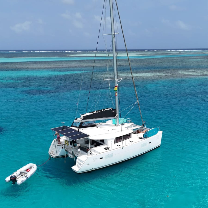Lagoon 40 EP catamaran sailing through the crystal-clear waters of the San Blas Islands, Panama.