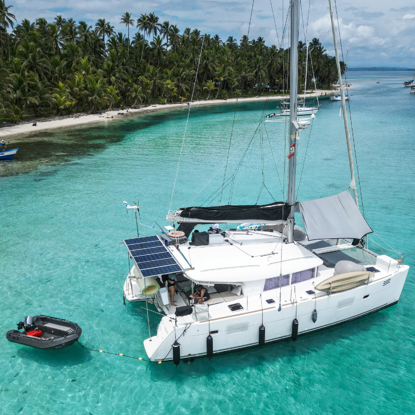 Lagoon 40 Catamaran sailing through the crystal-clear waters of the San Blas Islands in Panama.
